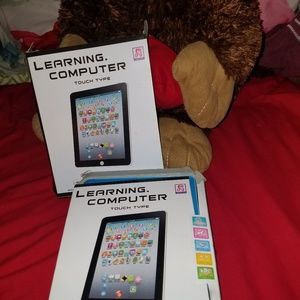 Kids play computer/tablets (toy)